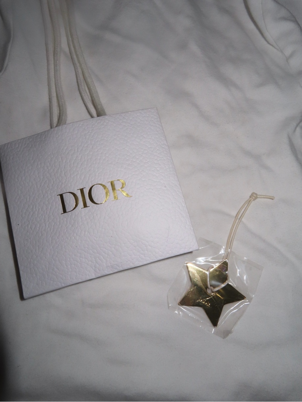 Dior White Mini Bag Charm with Gold Star
